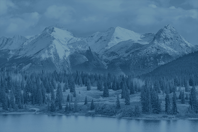 This image of the Rocky Mountains serves as a background until the document cover is rendered.